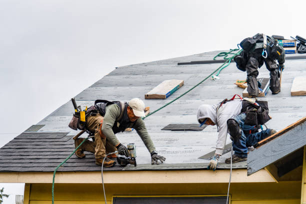 Professional Gutter Installation technician working in Cheshire, OR